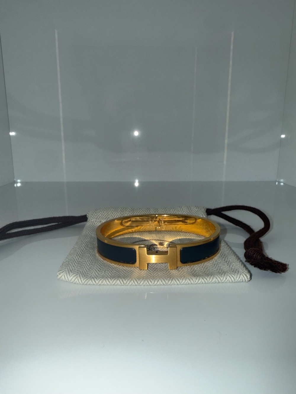 Hermes Gold-Tone Clic H Bracelet with Black Enamel